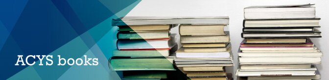 An informal stack of books with strips of blue in different tones.