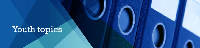 A row of blue folders with strips of blue in different tones